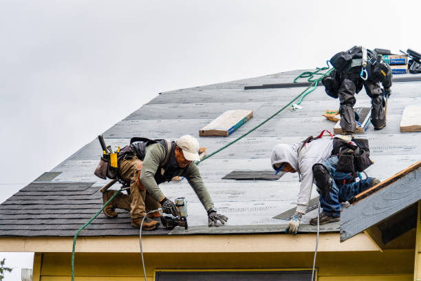 Professional Gutter Installation technician working in Winburne, PA